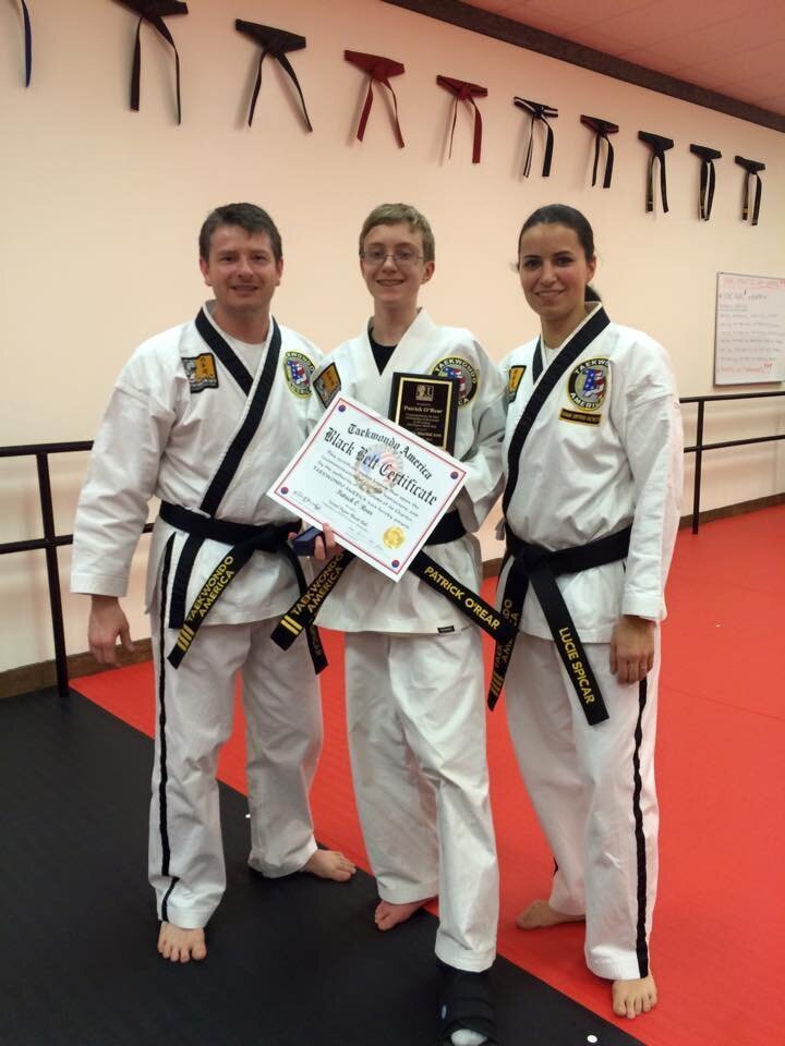 2nd degree blackbelt and outstanding with Spicars.jpg